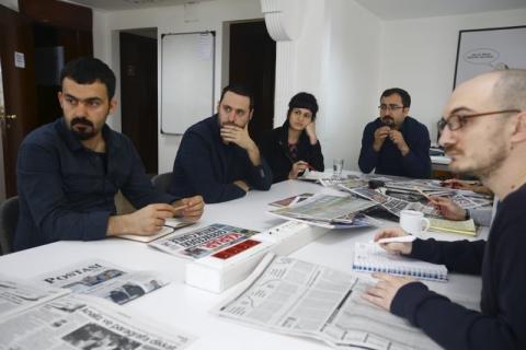 Baris Ince, (2nd L) editor of the left-wing Birgun newspaper attends a news meeting at Birgun newspaper in Istanbul, March 11, 2016. PHOTO BY REUTERS/Osman Orsal