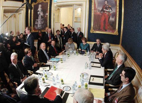 French Foreign Minister Laurent Fabius (3rd L), EU envoy Catherine Ashton (6th L), U.S. Secretary of State John Kerry (3rd R) and Britain's Foreign Secretary Philip Hammond (front L) sit a a table during talks in Vienna, November 21, 2014. PHOTO BY REUTERS/Heinz-Peter Bader