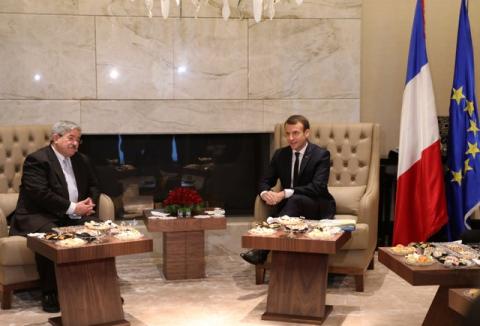 French President Emmanuel Macron (R) meets with Algerian Prime Minister Ahmed Ouyahia at the Zeralda complex in Zeralda, Algeria, December 6, 2017. PHOTO BY REUTERS/Ludovic Marin