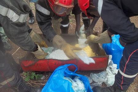 Senegalese police prepare to incinerate methamphetamines seized at the Malian border in Tambacounda, Senegal, June 29, 2014. PHOTO BY REUTERS/Pape Demba Sidibe