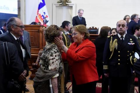 Chile's President Michelle Bachelet greets a supporter after delivering a speech in Santiago, Chile, October 7, 2016. PHOTO BY REUTERS/Chilean Presidency
