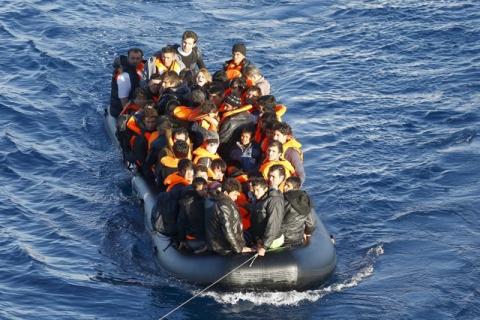 A dinghy full of refugees and migrants is towed by a Turkish Coast Guard fast rigid-hulled inflatable boat (not seen) on the Turkish territorial waters of the North Aegean Sea, following a failed attempt of crossing to the Greek island of Chios, off the shores of Izmir, Turkey, February 28, 2016. PHOTO BY REUTERS/Umit Bektas