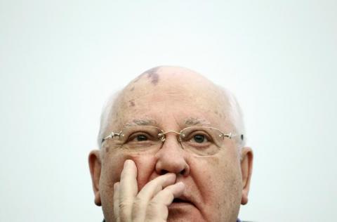 Former Soviet President Mikhail Gorbachev addresses students as he visits the International University in Moscow