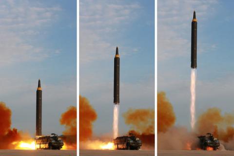 North Korean leader Kim Jong Un (not pictured) guides the launch of a Hwasong-12 missile in this undated combination photo released by North Korea's Korean Central News Agency (KCNA) on September 16, 2017. PHOTO BY REUTERS/KCNA