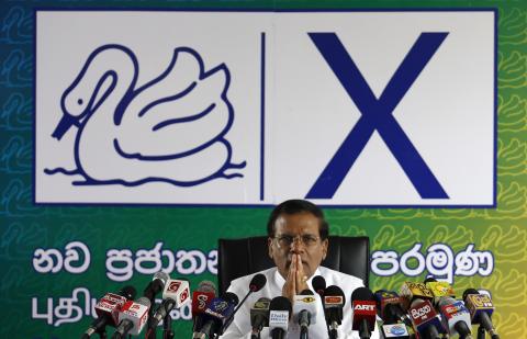 Sri Lanka's common presidential candidate Mithripala Sirisena gestures as he addresses the nation at his party's office in Colombo, January 5, 2015. PHOTO BY REUTERS/Dinuka Liyanawatte