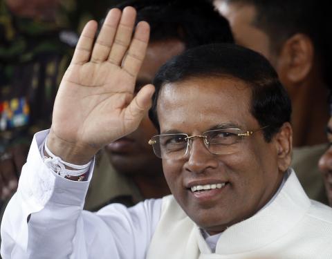 Sri Lanka's newly elected president Mithripala Sirisena waves at media as he leaves the election commission in Colombo, January 9, 2015. PHOTO BY REUTERS/Dinuka Liyanawatte