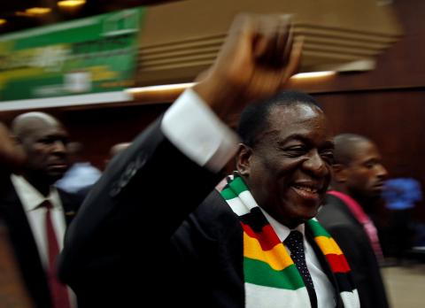 Zimbabwean President Emmerson Mnangagwa greets supporters of his ruling Zimbabwe African National Union – Patriotic Front (ZANU–PF) party at a rally in Harare, Zimbabwe, March 7, 2018. PHOTO BY REUTERS/Philimon Bulawayo