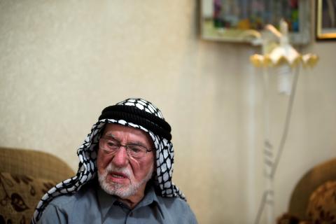 Mohammad Mahmoud Jadallah, a 96-year-old Palestinian from Sur Baher, a village in the suburbs of Arab east Jerusalem, sits in his house during an interview, May 8, 2018. PHOTO BY REUTERS/Ronen Zvulun
