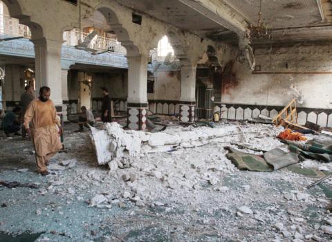 Relatives inspect after an overnight suicide attack at a mosque in Herat, Afghanistan, August 2, 2017. PHOTO BY REUTERS/Mohammad Shoib