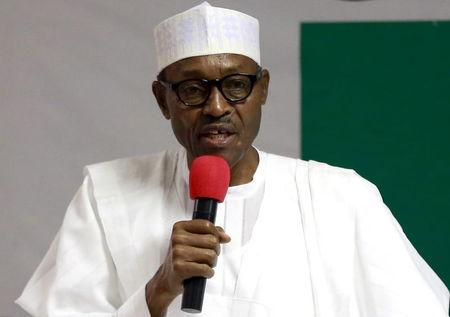 President Muhammadu Buhari addresses members of the National Working Committee during the meeting of the All Progressives Congress (APC) party at the headquarters of the party in Abuja, Nigeria, July 3, 2015. PHOTO BY REUTERS/Afolabi Sotunde