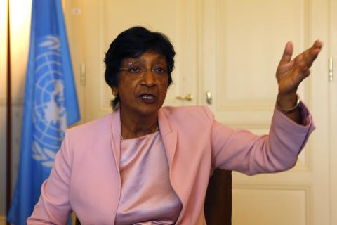 Outgoing U.N. Human Rights Commissioner Navi Pillay talks during an interview to Reuters in her office in Geneva