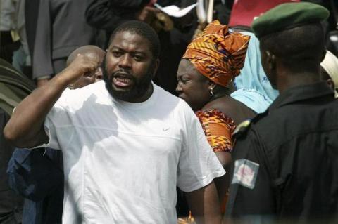 Nigeria's former militia leader Mujahid Dokubo-Asari gestures as he walks out of the federal high court in Abuja