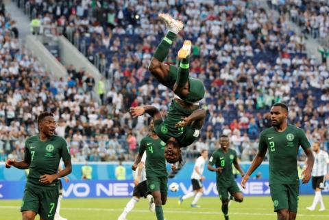 Nigeria's Victor Moses celebrates scoring their first goal. PHOTO BY REUTERS/Toru Hanai