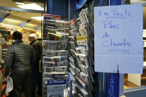 A handwritten sign, which reads "No more Charlie", is displayed after it sold out the limited stock of the satirical newspaper in Paris, January 14, 2015. PHOTO BY REUTERS/John Schults