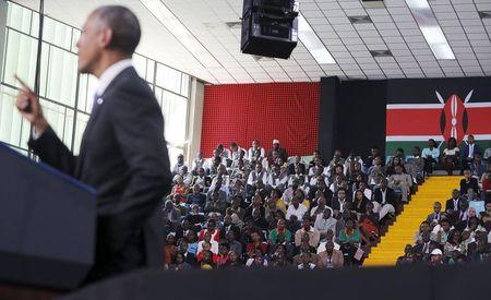 People listen as U.S. President Barack Obama delivers remarks at an indoor stadium in Nairobi July 26, 2015. Obama told Kenyans on Sunday on his first presidential trip to his father's homeland that there was "no limit to what you can achieve" but said they had to deepen democracy, tackle corruption and end exclusion based on gender or ethnicity. PHOTO BY REUTERS/Jonathan Ernst