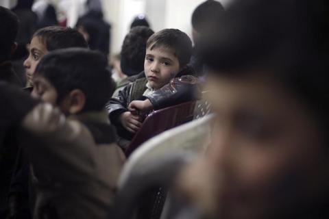Orphans attend a gathering organized by Douma charity organization for orphans in Douma , near Damascus, December 5, 2014. PHOTO BY REUTERS/Bassam Khabieh