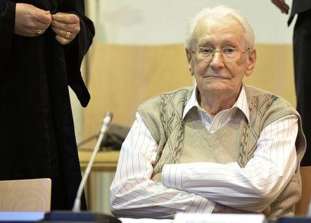 Defendant Oskar Groening awaits the start of his trial in a courtroom in Luneburg, April 21, 2015. PHOTO BY REUTERS/Julian Stratenschulte