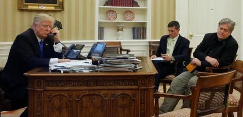 President Trump, with National Security Advisor Michael Flynn and senior advisor Steve Bannon, speaks by phone with Australia's Prime Minister Malcolm Turnbull. PHOTO BY REUTERS/Jonathan Ernst