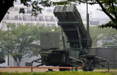 A Japan Self-Defense Forces soldier walks near a unit of Patriot Advanced Capability-3 (PAC-3) missiles at the Defense Ministry in Tokyo, Japan, June 22, 2016. PHOTO BY REUTERS/Toru Hanai