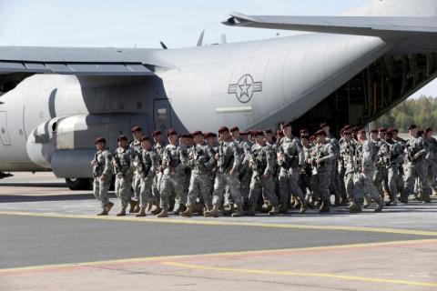 First company-sized contingent of about 150 U.S. paratroopers from the U.S. Army's 173rd Infantry Brigade Combat Team based in Italy arrive in the airport in Riga, Latvia, April 24, 2014. PHOTO BY REUTERS/Ints Kalnins