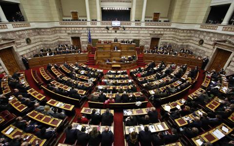 Greek Prime Minister Alexis Tsipras delivers his first major speech in parliament in Athens, February 8, 2015. PHOTO BY REUTERS/Kostas Tsironis
