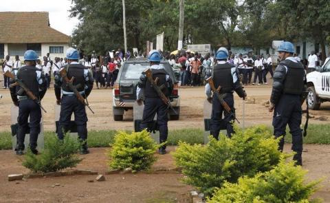 Peacekeepers serving in the United Nations Organization Stabilization Mission in the Democratic Republic of the Congo (MONUSCO) stand guard in a formation following recent demonstrations in Beni in North Kivu province, October 23, 2014. PHOTO BY REUTERS/Kenny Katombe