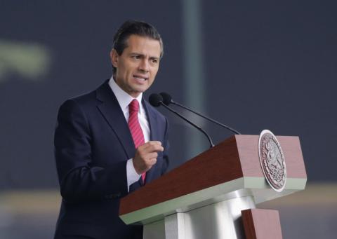 Mexico's President Enrique Pena Nieto speaks during a military parade in celebration of the 104th anniversary of the Mexican Revolution, at Campo Marte in Mexico City, November 20, 2014. PHOTO BY REUTERS /Henry Romero