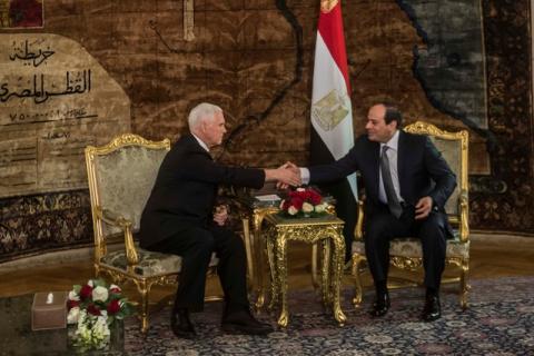 Egyptian President Abdel Fattah al-Sisi (R) shakes hands with with U.S. Vice President Mike Pence during their meeting at the Presidential Palace in Cairo, Egypt, January 20, 2018. PHOTO BY REUTERS/ Khaled Desouki