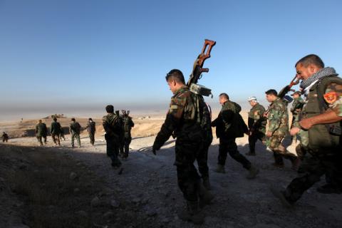 Peshmerga forces walk in the east of Mosul during operation to attack Islamic State militants in Mosul, Iraq, October 17, 2016. PHOTO BY REUTERS/Azad Lashkari