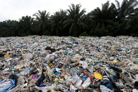 Plastic waste are piled outside an illegal recycling factory in Jenjarom, Kuala Langat, Malaysia, October 14, 2018. PHOTO BY REUTERS/Lai Seng Sin