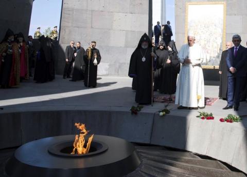 Pope Francis and Catholicos of All Armenians Karekin II attend a ceremony in commemoration of Armenians killed by Ottoman forces during World War One at the Tzitzernakaberd Genocide Memorial in Yerevan, Armenia, June 25, 2016. PHOTO BY REUTERS/Maurizio Brambatti