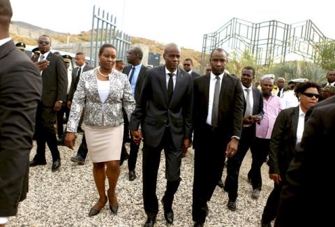 Haiti's President President Jovenel Moise (C) and first lady Martine Moise (L) attend an event in commemoration of the eighth anniversary and day of remembrance for the people killed on the island by a devastating earthquake, in Port-au-Prince, Haiti, January 12, 2018. PHOTO BY REUTERS/Jeanty Junior Augustin