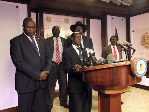 South Sudan Second Vice President James Wani Igga (C), flanked by South Sudan President Salva Kiir (R) and First Vice President Riek Machar (L), addresses a news conference at the Presidential State House in Juba, South Sudan, July 8, 2016. PHOTO BY REUTERS/Stringer