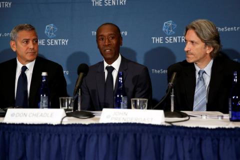 Actors George Clooney (L-R) and Don Cheadle and The Sentry Co-founder John Prendergast discuss The Sentry's investigation of the role of national corruption in the ongoing humanitarian crisis in South Sudan during a news conference at the National Press Club in Washington, U.S., September 12, 2016. PHOTO BY REUTERS/Jonathan Ernst