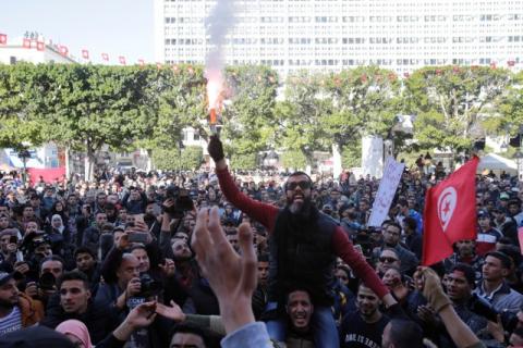 People shout slogans during demonstrations on the seventh anniversary of the toppling of president Zine El-Abidine Ben Ali, in Tunis, Tunisia, January 14, 2018. PHOTO BY REUTERS/Youssef Boudlal