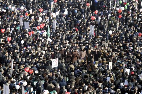 People attend a rally titled "Love for the Prophet Mohammad" to protest against satirical cartoons of the prophet, in Grozny, Chechnya, January 19, 2015. PHOTO BY REUTERS/Eduard Korniyenko