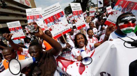 Members of the civil society chant slogans during a protest dubbed "Stop extrajudicial killings" on the killing of human rights lawyer, Willie Kimani, his client and their driver in Nairobi, Kenya, July 4, 2016. PHOTO BY REUTERS/Thomas Mukoya