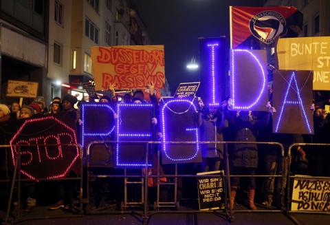 Protesters take part in an anti-racism demonstration against the anti-immigration movement Patriotic Europeans Against the Islamisation of the West (PEGIDA) in Duesseldorf, January 12, 2015. PHOTO BY REUTERS/Ina Fassbender