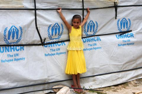 A Syrian refugee girl stands outside a tent as she poses at a refugee camp in Zahrani town, southern Lebanon, June 13, 2018. PHOTO BY REUTERS/Ali Hashisho