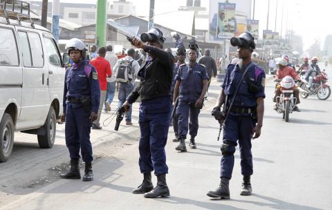 Riot policemen patrol along a street during a nation-wide protest as opposition parties tried to block a change in the law that may delay elections, in Goma eastern Democratic Republic of Congo, January 19, 2015. PHOTO BY REUTERS/Kenny Katombe