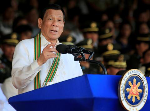 Philippine President Rodrigo Duterte gestures as he delivers a speech during the 121st founding anniversary of the Philippine Army (PA) at Taguig city, Metro Manila, Philippines, March 20, 2018. PHOTO BY REUTERS/Romeo Ranoco