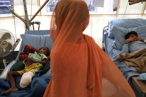 Rohingya refugees Mohammed Saiful, 6, (L) and Nur Hashim, 9, recover in the Norwegian-Finnish Red Cross field hospital at Kutupalong refugee camp near Cox's Bazar, Bangladesh, November 22, 2017. PHOTO BY REUTERS/Susana Vera