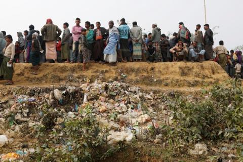 Rohingya refugees line up for daily essentials distribution at Balukhali camp, near Cox's Bazar, Bangladesh, January 15, 2018. PHOTO BY REUTERS/Tyrone Siu