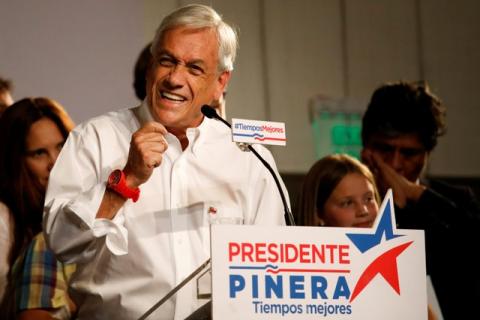 Chilean presidential candidate Sebastian Pinera delivers a speech to supporters after leading in the first round of general elections in Santiago Chile, November 19, 2017. PHOTO BY REUTERS/Carlos Garcia Rawlins