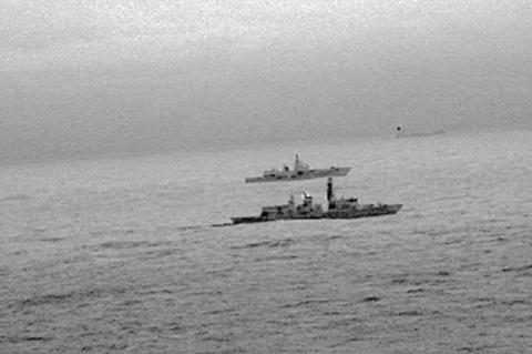 Images from an infrared camera on a helicopter show Royal Navy frigate HMS St Albans escorting Russian warship Admiral Gorshkov as it passes close to UK territorial waters through the North Sea, December 25, 2017. PHOTO BY REUTERS/Royal Navy