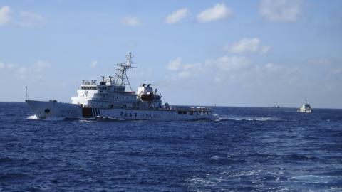 Chinese coastguard ships give chase to Vietnamese coastguard vessels (not pictured) after they came within 10 nautical miles of the Haiyang Shiyou 981, known in Vietnam as HD-981, oil rig in the South China Sea