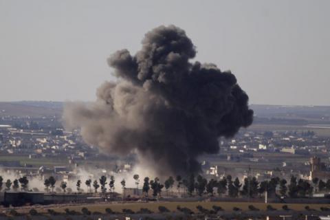 Smoke rises from the northern Syrian town of al-Bab, Syria, February 2, 2017. PHOTO BY REUTERS/Khalil Ashawi