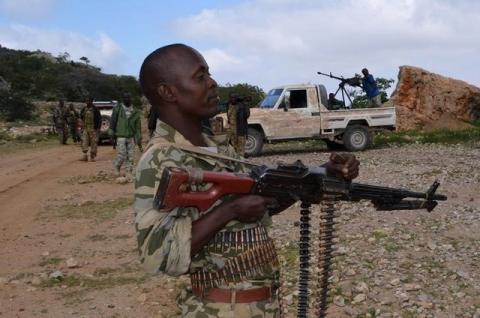 A soldier from Somalia's Puntland keeps guard on high grounds at the Galgala hills, during preparations for an offense against al Shabaab militants. PHOTO BY REUTERS/Abdiqani Hassan
