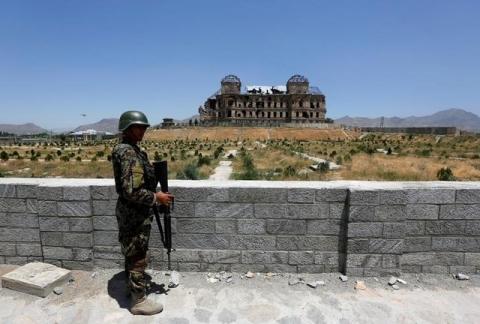 An Afghan National Army (ANA) soldier stands guard after the inauguration of the reconstruction project to restore the ruins of historic Darul Aman palace, in Kabul, Afghanistan, May 30, 2016. PHOTO BY REUTERS/Omar Sobhani