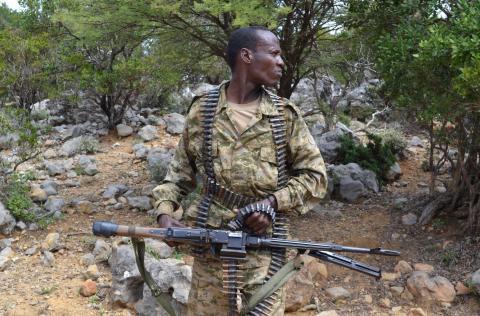 A soldier from Somalia's Puntland keeps guard on high grounds at the Galgala hills, during preparations for an offense against al Shabaab militants, January 8, 2015. PHOTO BY REUTERS/Abdiqani Hassan